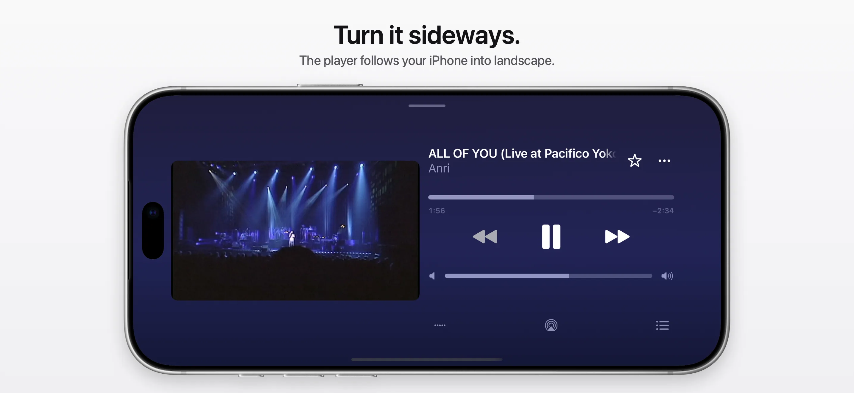 The player turned sideways, a music video beside its controls